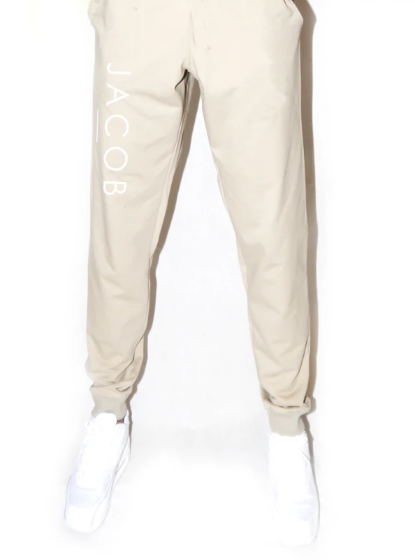SPODNIE UNISEX BEŻOWE Z BIAŁYM LOGO